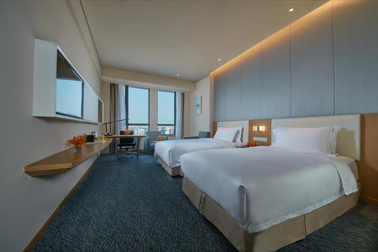 Holiday Inn Express Nantong Textile City By Ihg Bagian luar foto