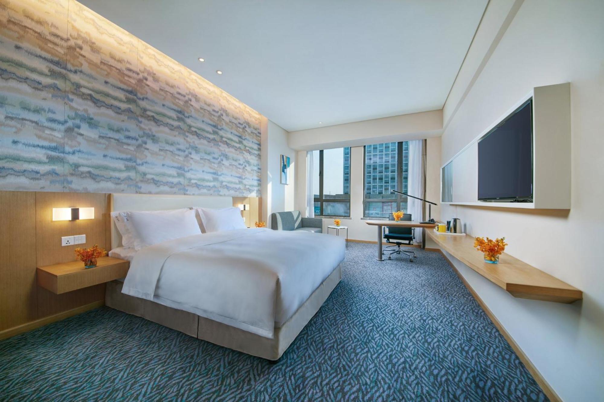 Holiday Inn Express Nantong Textile City By Ihg Bagian luar foto