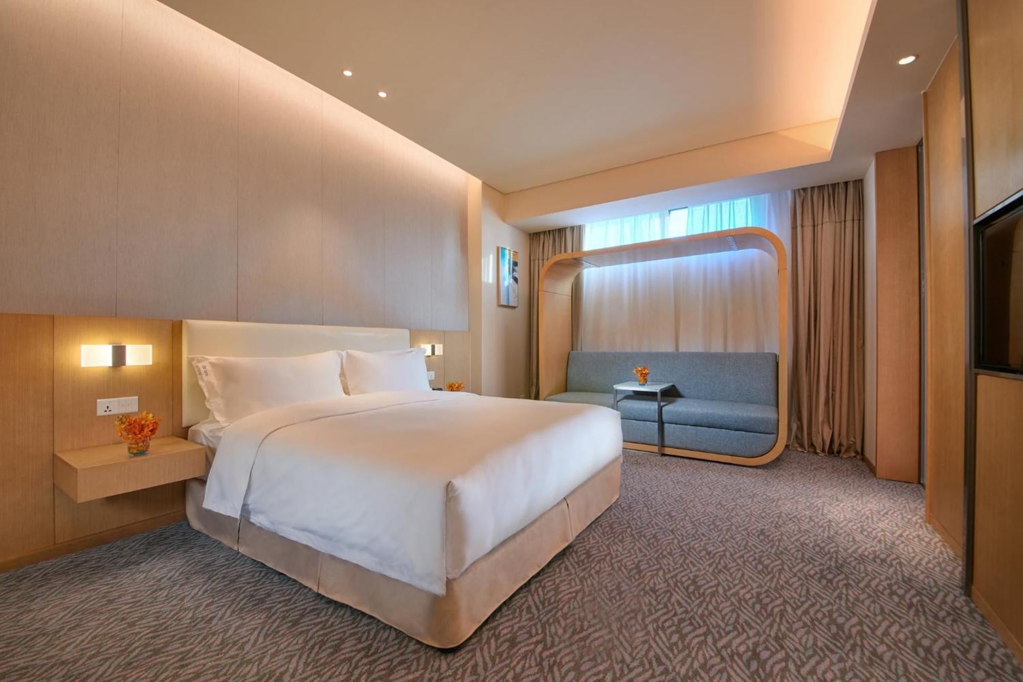 Holiday Inn Express Nantong Textile City By Ihg Bagian luar foto