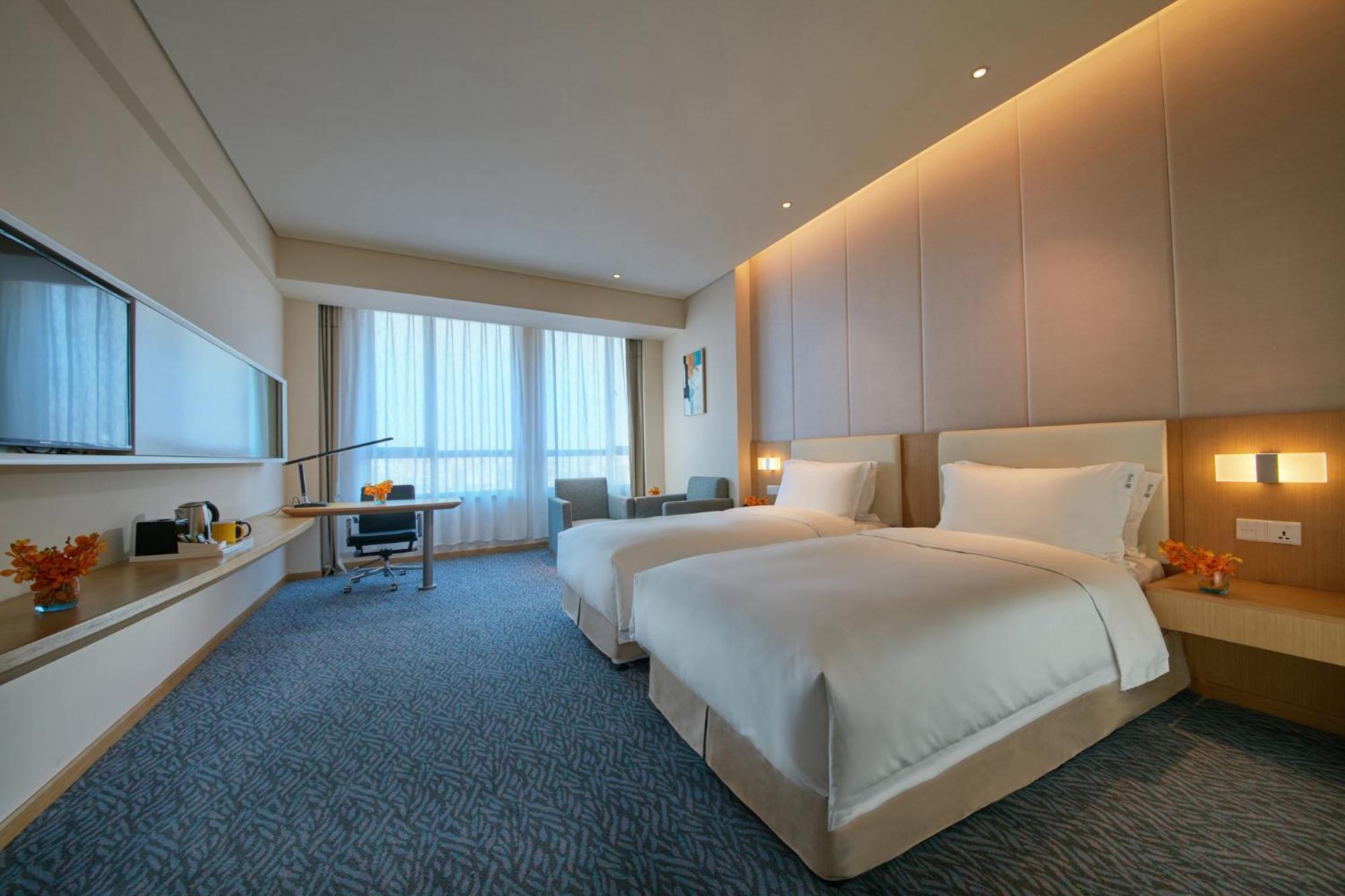 Holiday Inn Express Nantong Textile City By Ihg Bagian luar foto