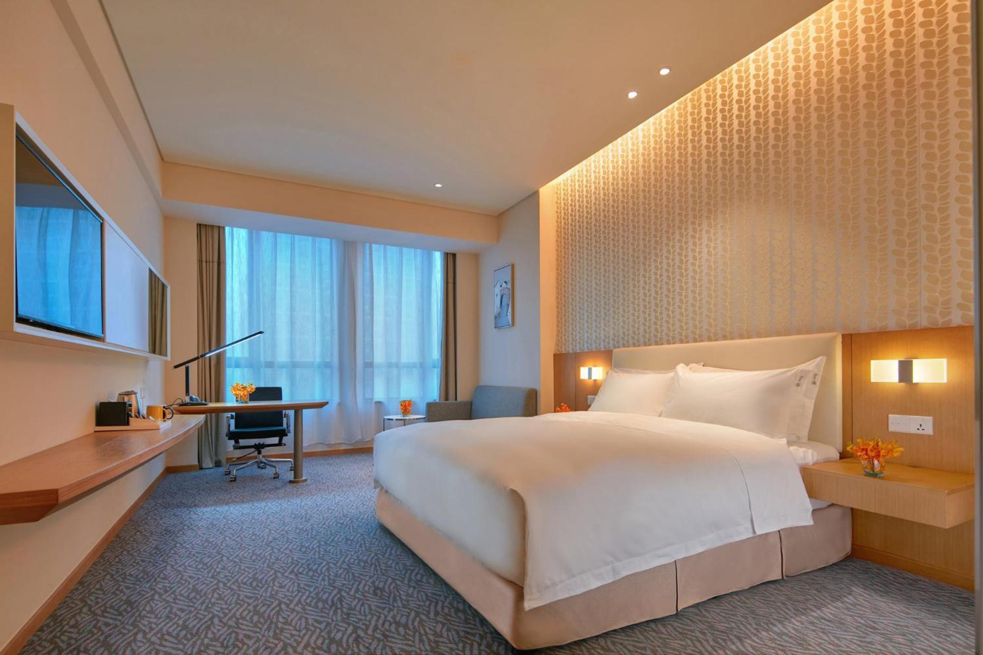 Holiday Inn Express Nantong Textile City By Ihg Bagian luar foto