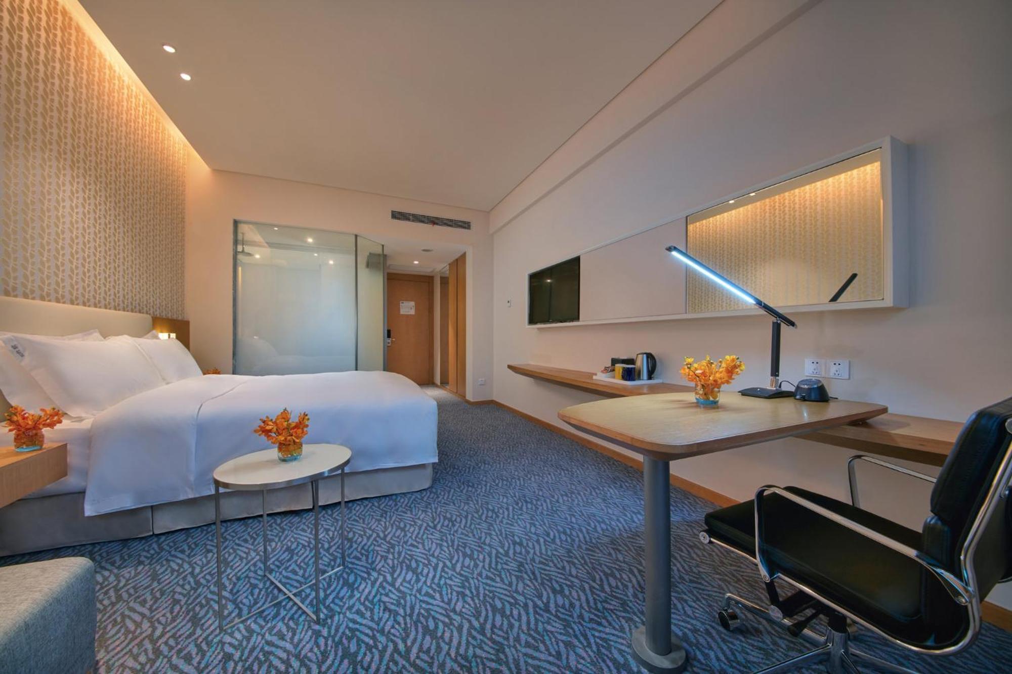 Holiday Inn Express Nantong Textile City By Ihg Bagian luar foto